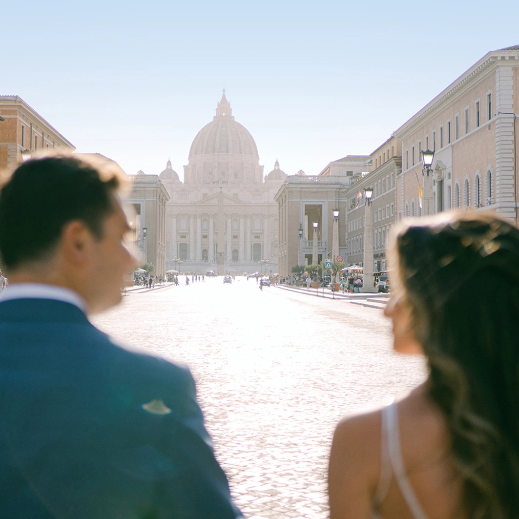 the couple facing the vatican in Rome, Italy