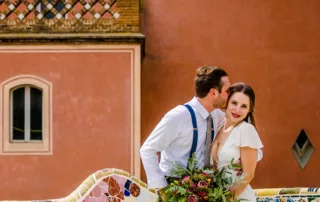 The couple in front a vintage house with a typical color