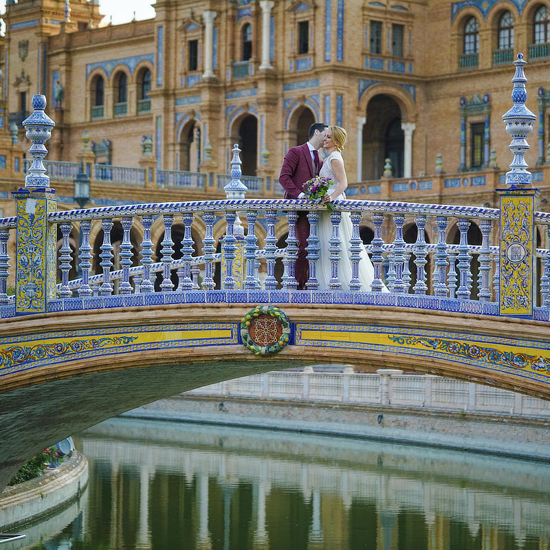 a shot on a vintage bridge with ceramic decoration in Seville at Plaza de Espana