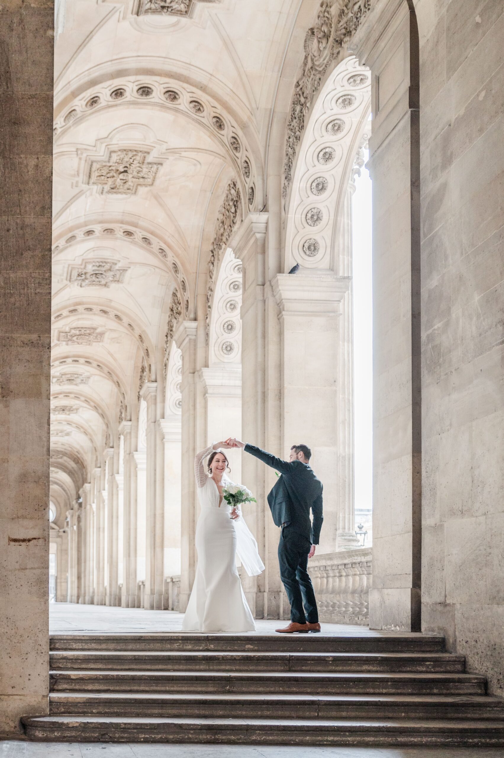 First dance at the louvre corridor bride and groom does their first dance at the Louvre corridor
