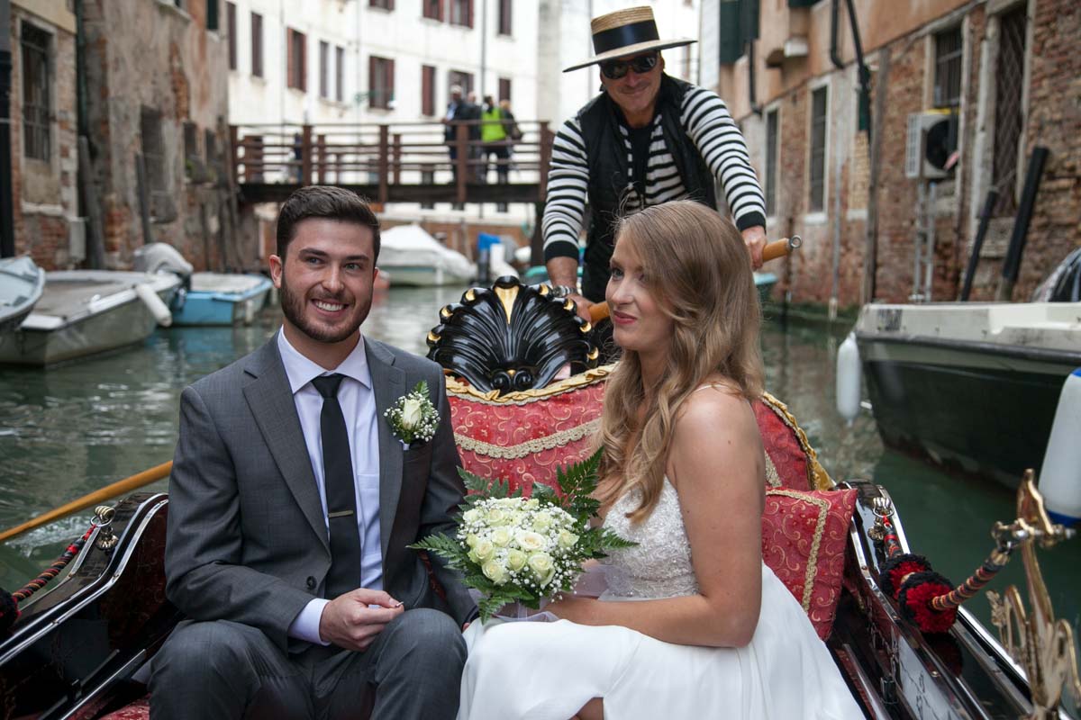 001-elopement in venice-1 The couple smiling in the boat