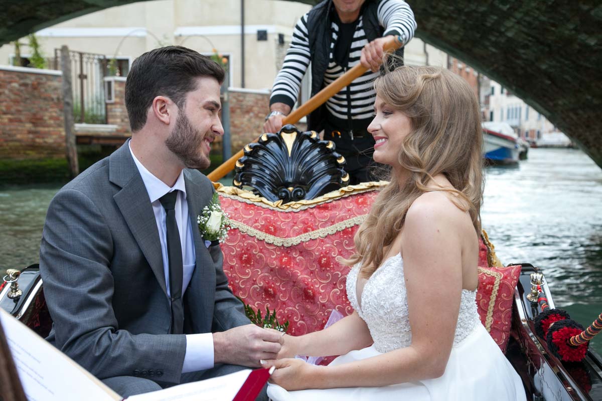 003-elopement in venice-17 The groom says his vows to the bride in the gondola