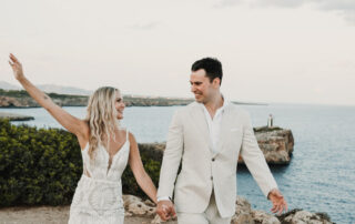to the fish the day and to go for having a diner, the bride and groom walk hand on hand