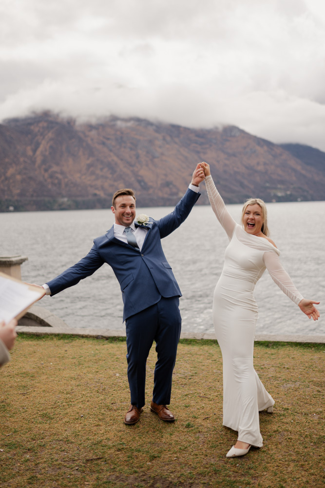 The happy couple after the ceremony with the marriage certificat