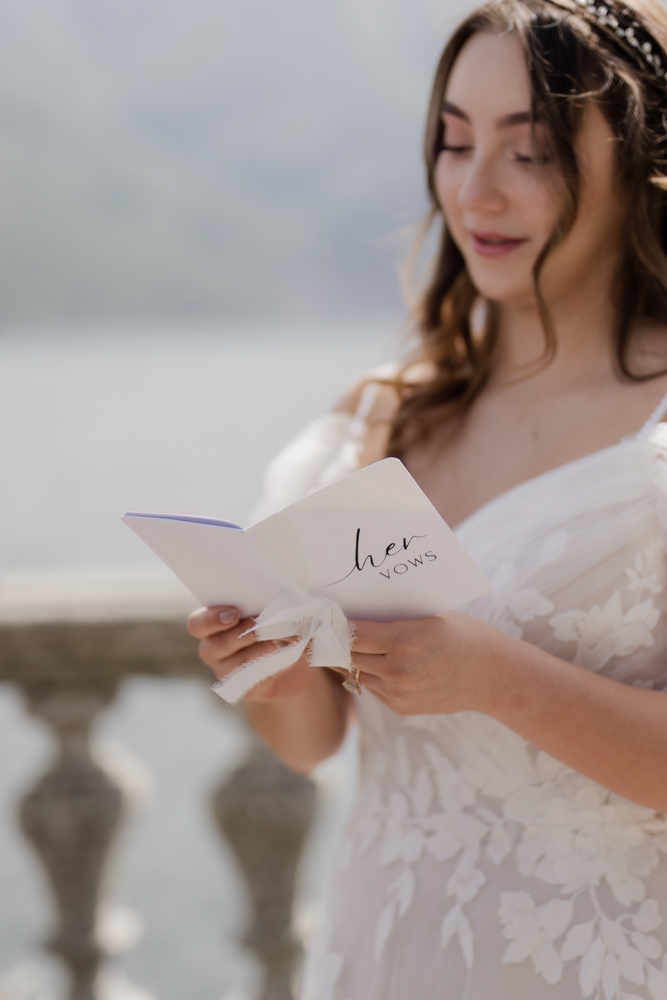The bride saying his vows in front of the groom.