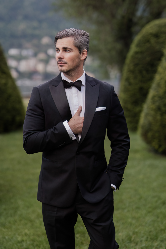 the groom posing after the wedding cerelmony