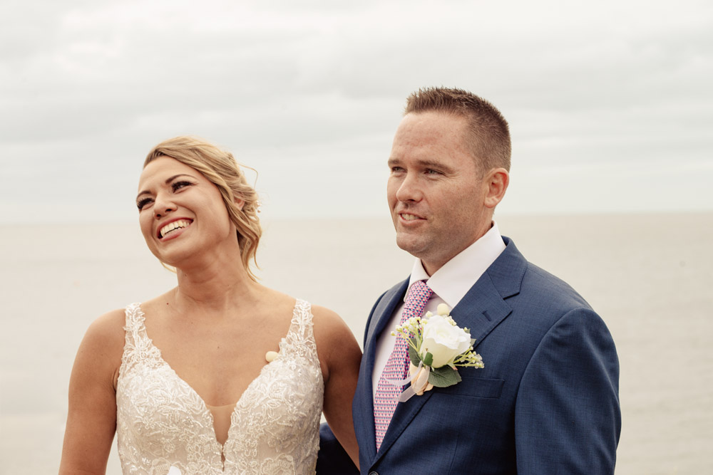 elopement wedding in Ireland-059-060 the couple with emotions to listent to the reading