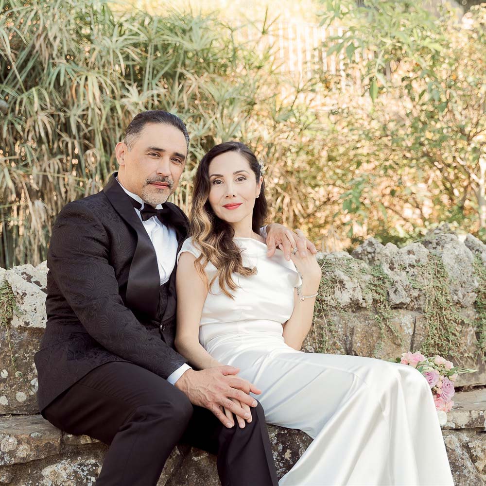 wedding in Florence-102-005 The couple posing after their renew of vows in a garden in Florence
