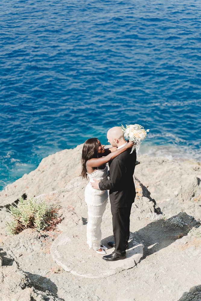 The couple in a love intimate moment after the ceremony at Bonassola, Cinque terre