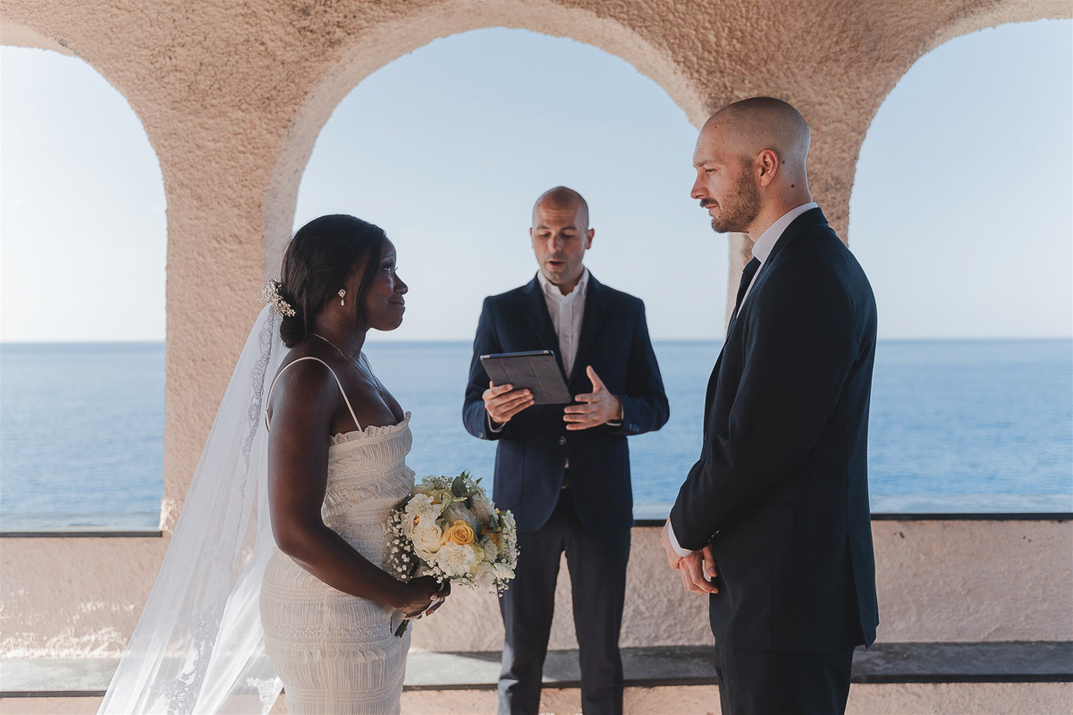 The celebrant start the speech of the ceremony in Cappella della Madonnina della Punta