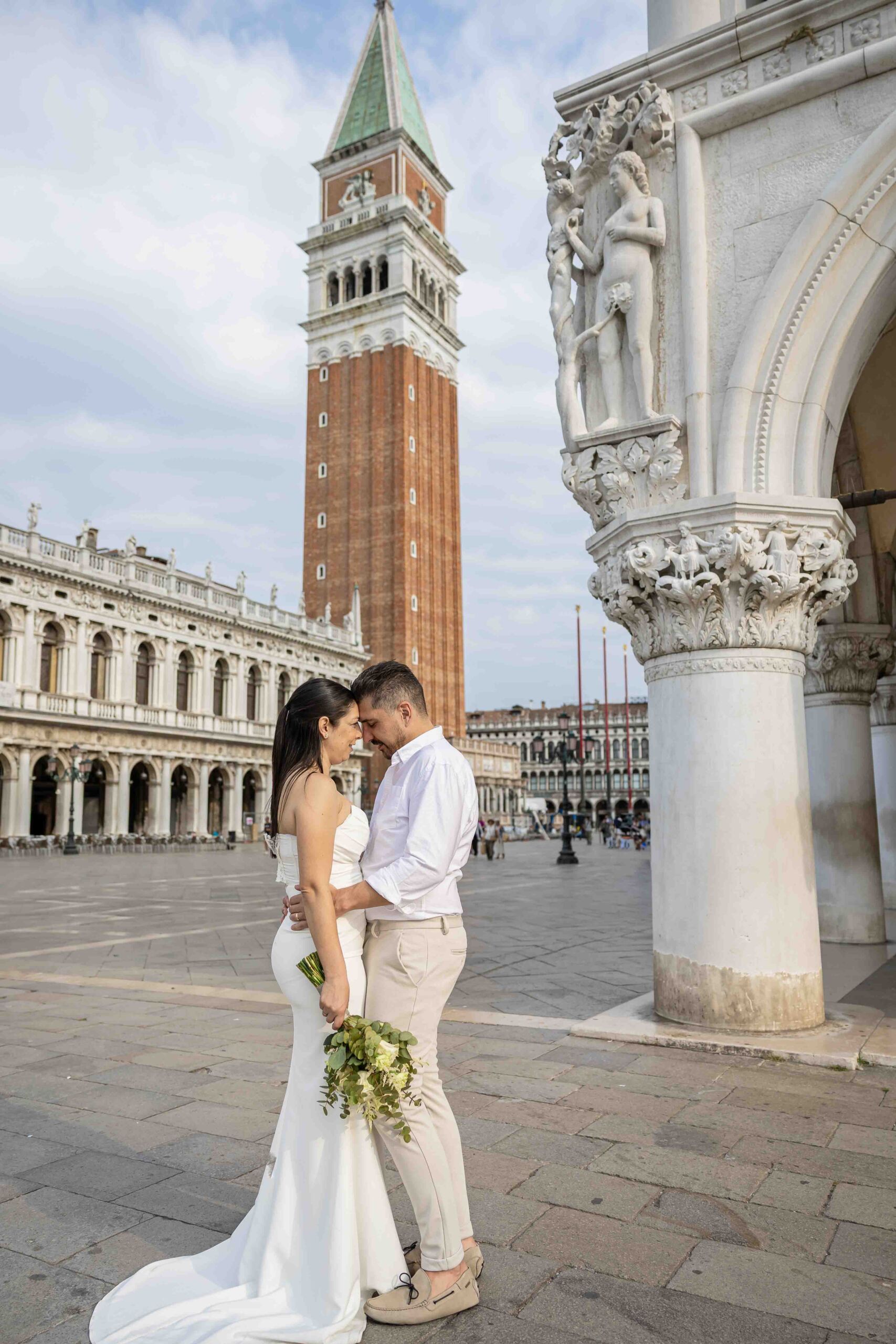 The couple embraced each other for their Elopement on St. Mark's Square in Venice