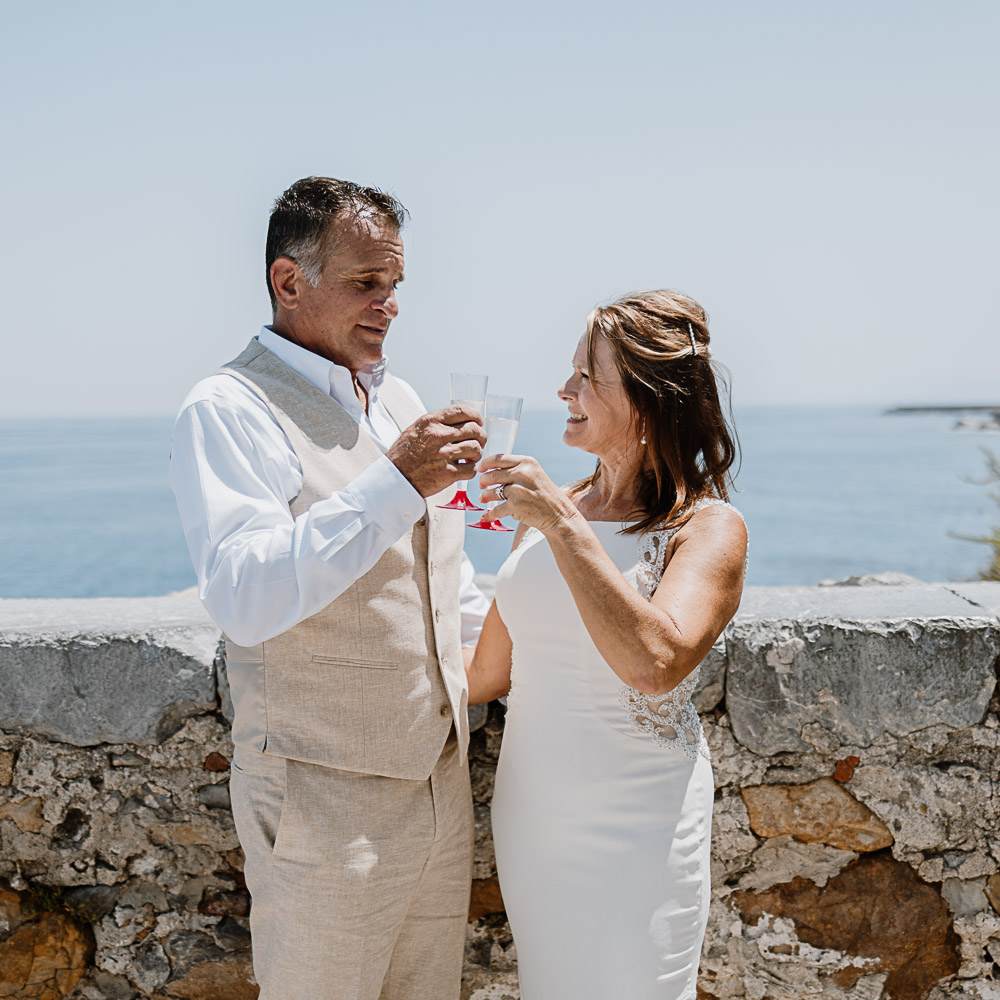 Vow renewal in Sicily – 001 the couple celebrates their renew of vows in Sicily with a glass of Prosecco