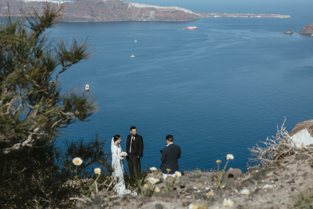 wedding packages during a stopover-0922-003 The couple over th esee during the ceremony, with their cruise boat in the back ground during a stop over in Sicily