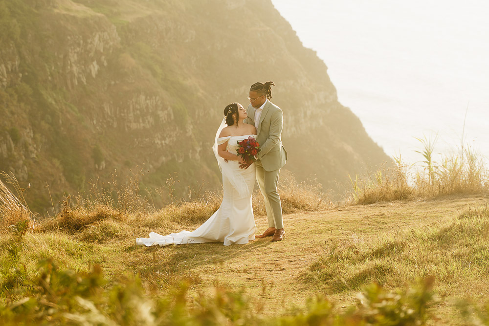 Elopement in Madeira, Portugal – 037 A love pose with breide and groom before the ceremony of elopement on the cliff