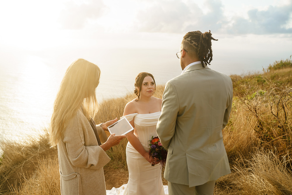 Elopement in Madeira, Portugal – 047 ceremony at golden hour on the cliff, the celebrant read the text, Garganta Funda, Madeira