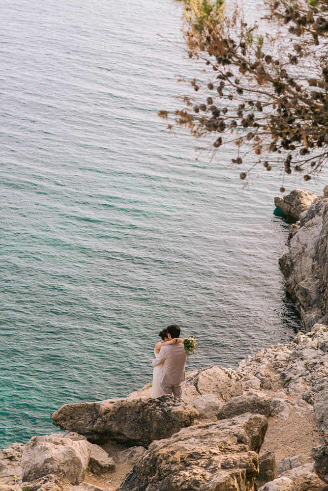 Sintra Elopement wedding – 001 A typical scenery with rock, tree, blue sea for the photoshoot of the couple