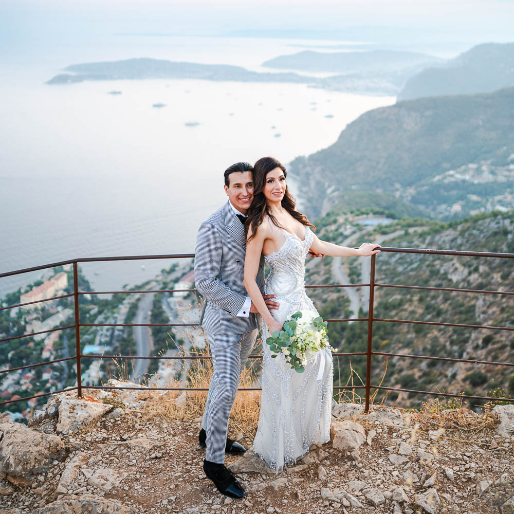 Vows renewal in Monaco – 001 The couple on a balcony for a photo above the Monaco bay