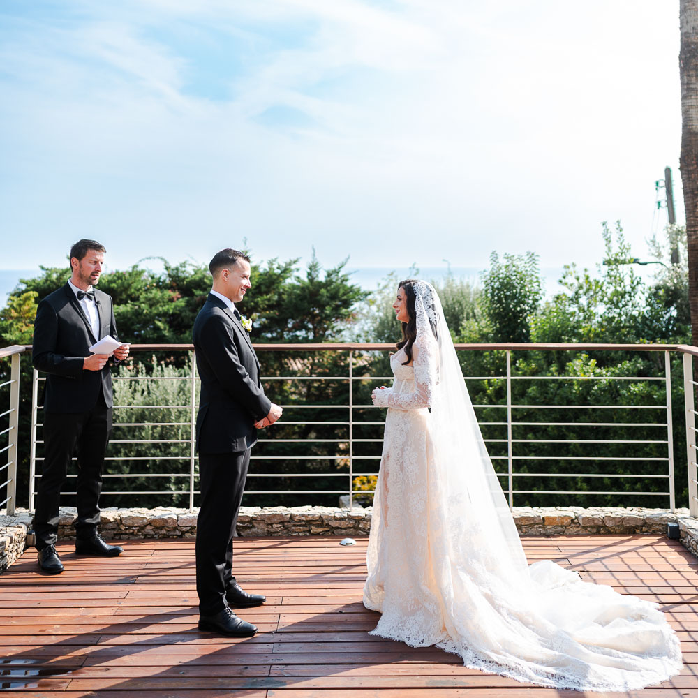 Wedding in Monaco – 001 the couple during a wedding ceremony on a private balcony over the see in Monaco